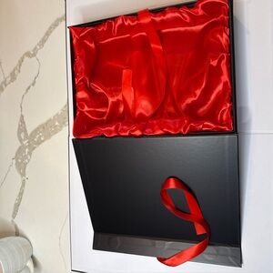 Sleek Black Box with Vibrant Red Satin Interior
